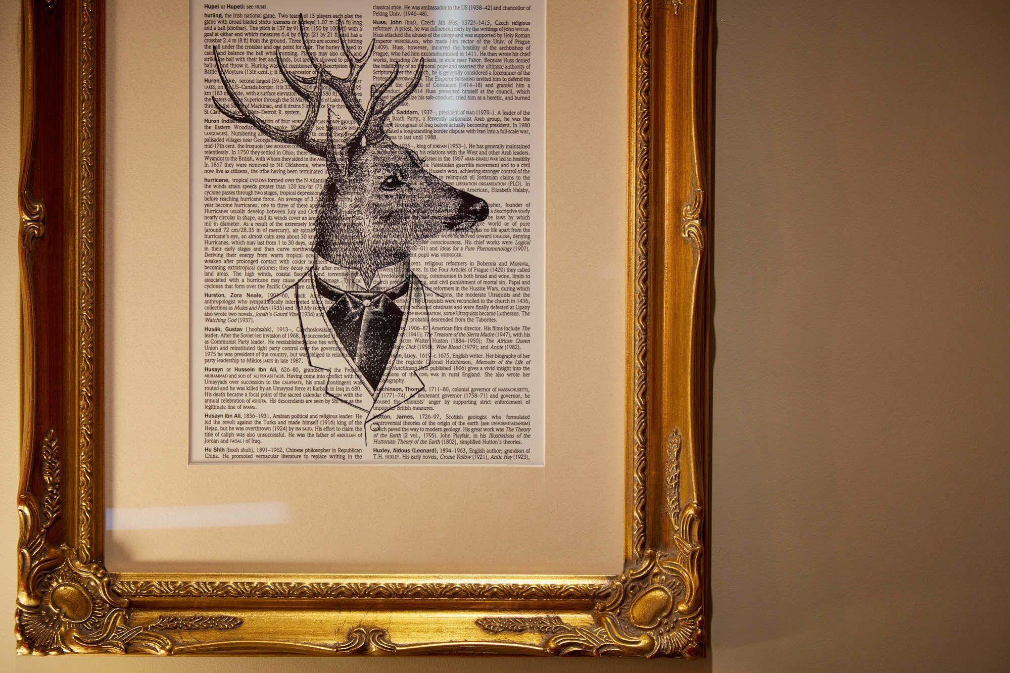 Oddfellows On The Park Cheadle  Esterno foto A framed print of a deer head with a bow tie